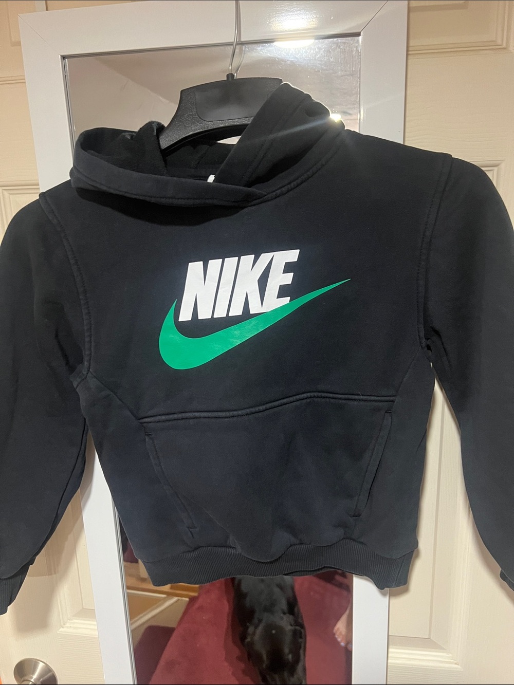 Nike Kids Black Hoodie with White Logo and Green Swoosh